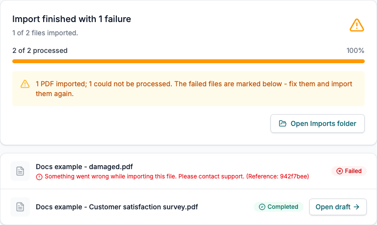 The progress page after an import with one failed file. The failed row shows a red message and the reference, and the other file is Completed.